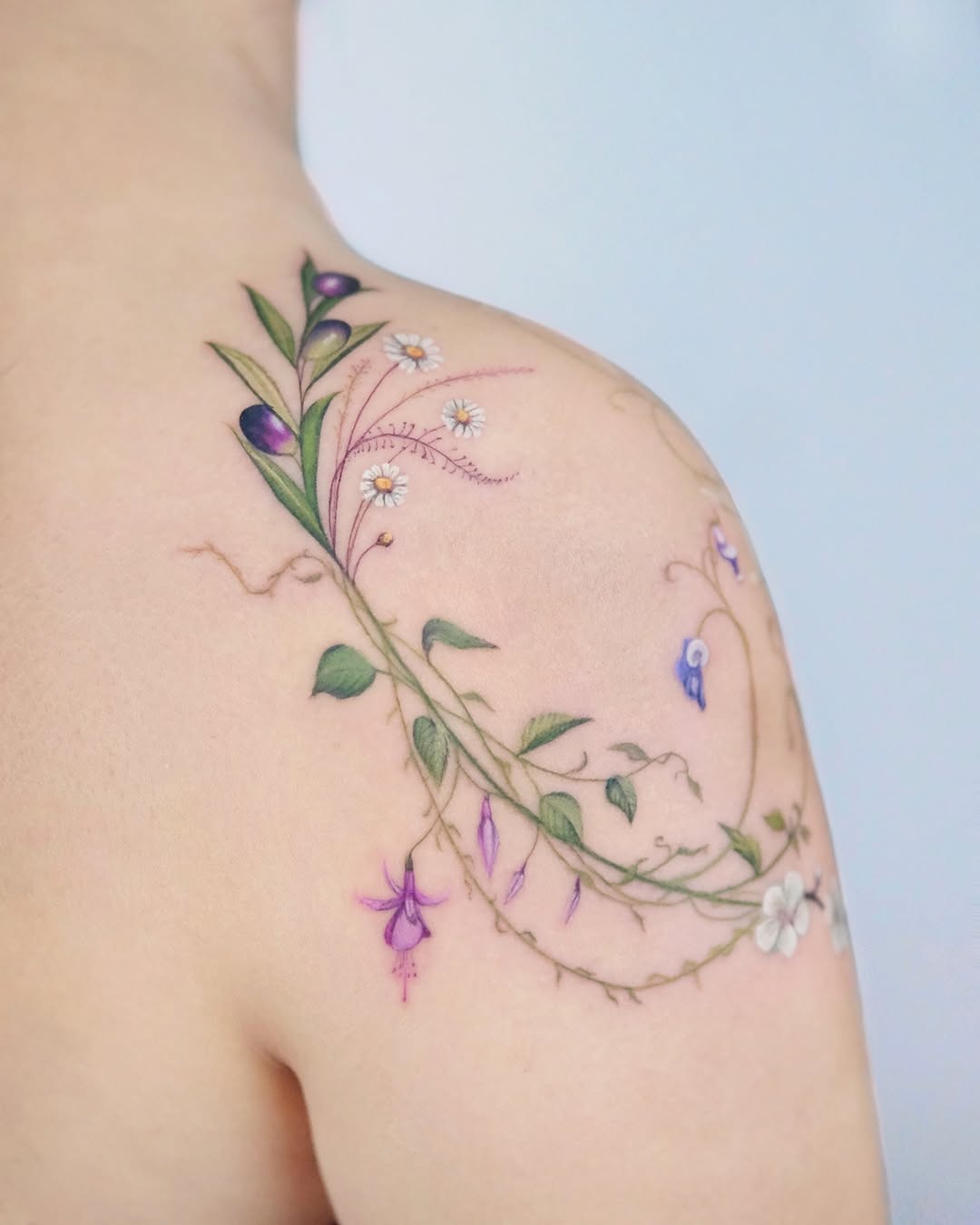 Elegant wildflower tattoo on shoulder Tattoo Design