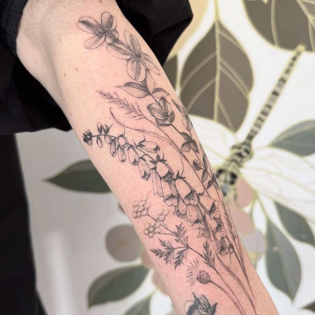 Elegant wildflower tattoo showcasing intricate details Tattoo Design