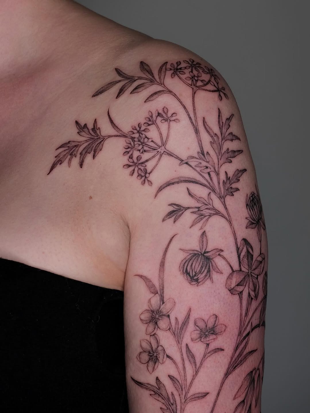 Intricate wildflower design on the arm Tattoo Design