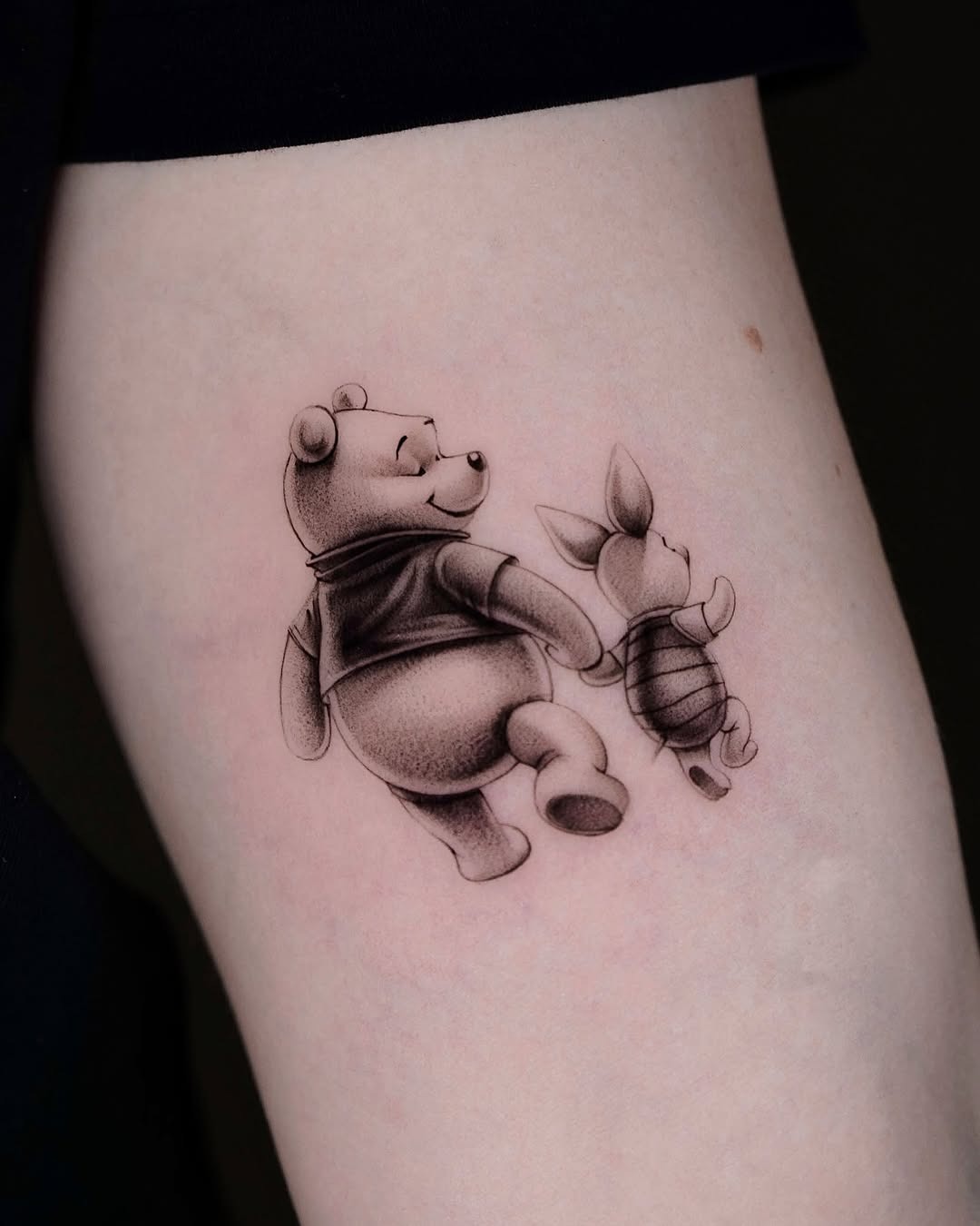 Adorable Pooh and Piglet Walking Together Tattoo Design