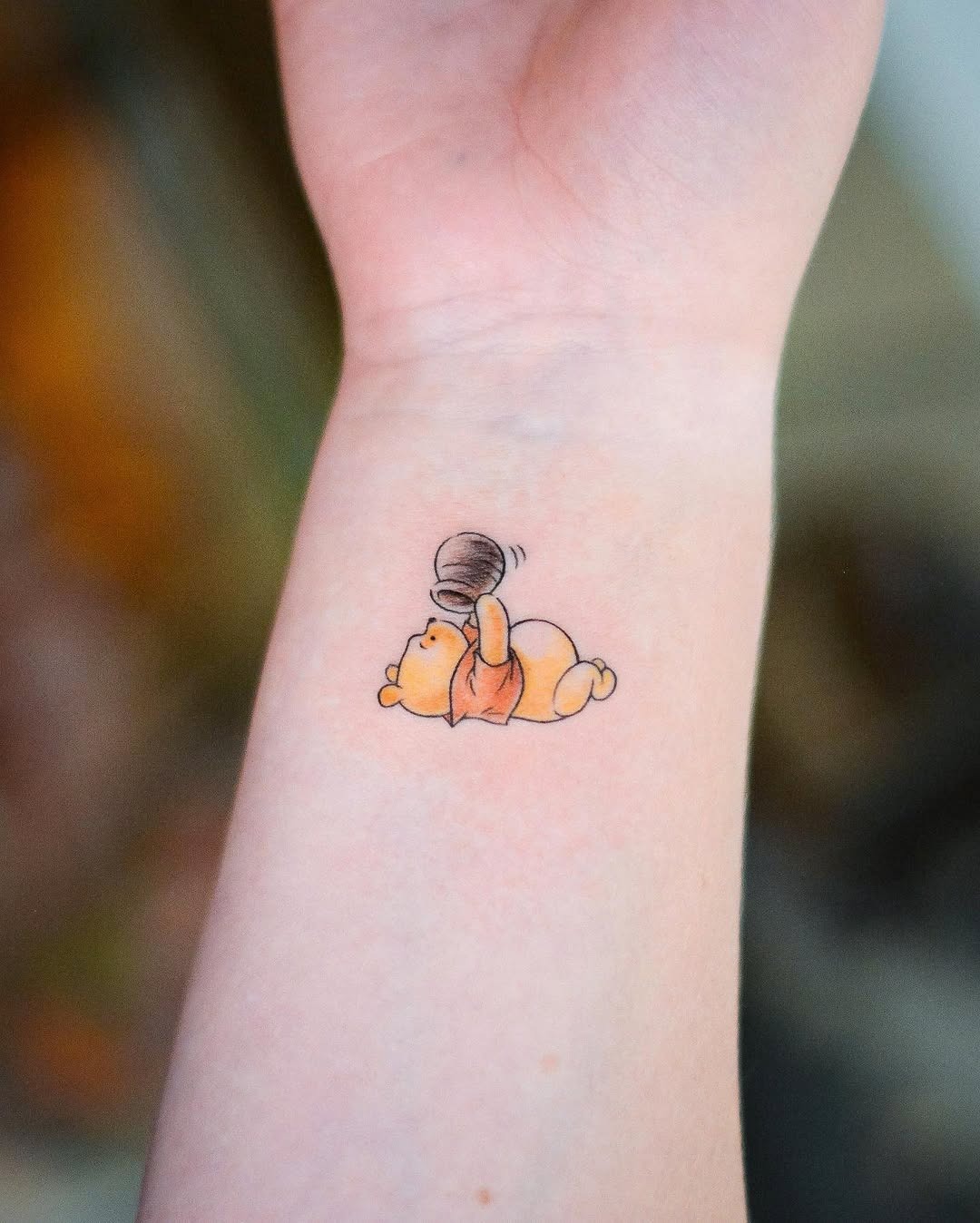 Adorable Winnie the Pooh Honey Tattoo Example Tattoo Design