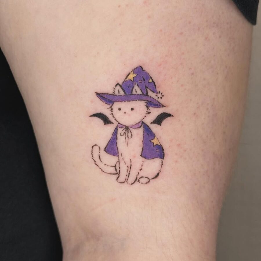 Adorable cat with a whimsical witch hat tattoo Tattoo Design