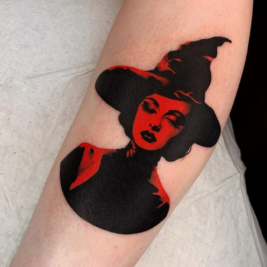 Bold witch hat tattoo with striking contrasts Tattoo Design