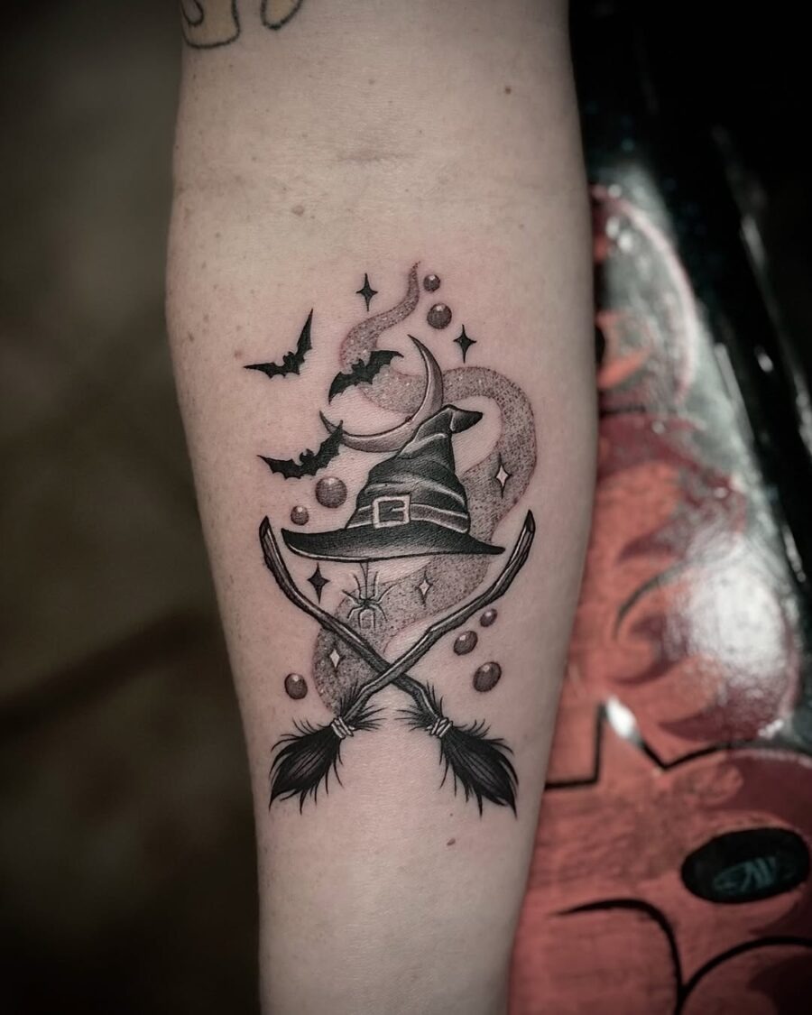 Charming witch hat tattoo with mystical elements Tattoo Design