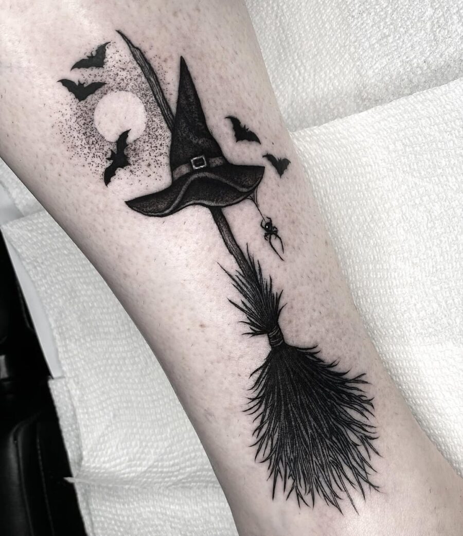 Charming witch hat tattoo with spooky elements Tattoo Design