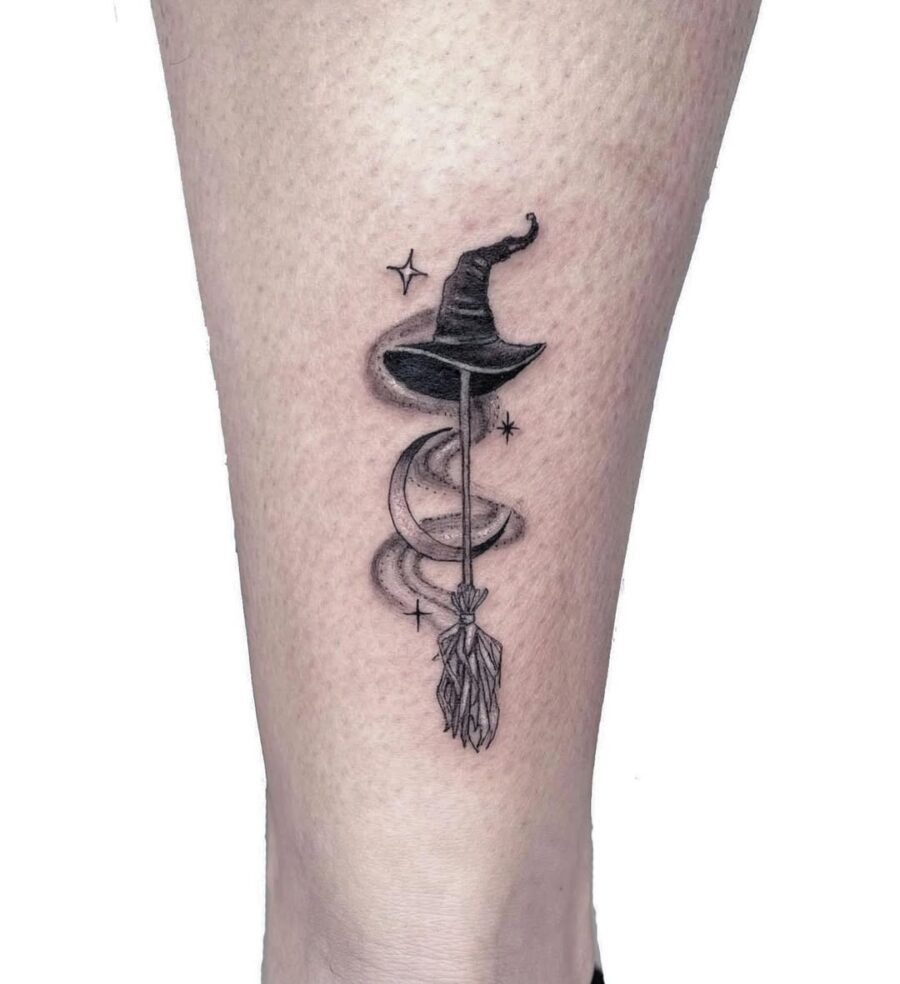 Elegant witch hat tattoo featuring celestial elements Tattoo Design