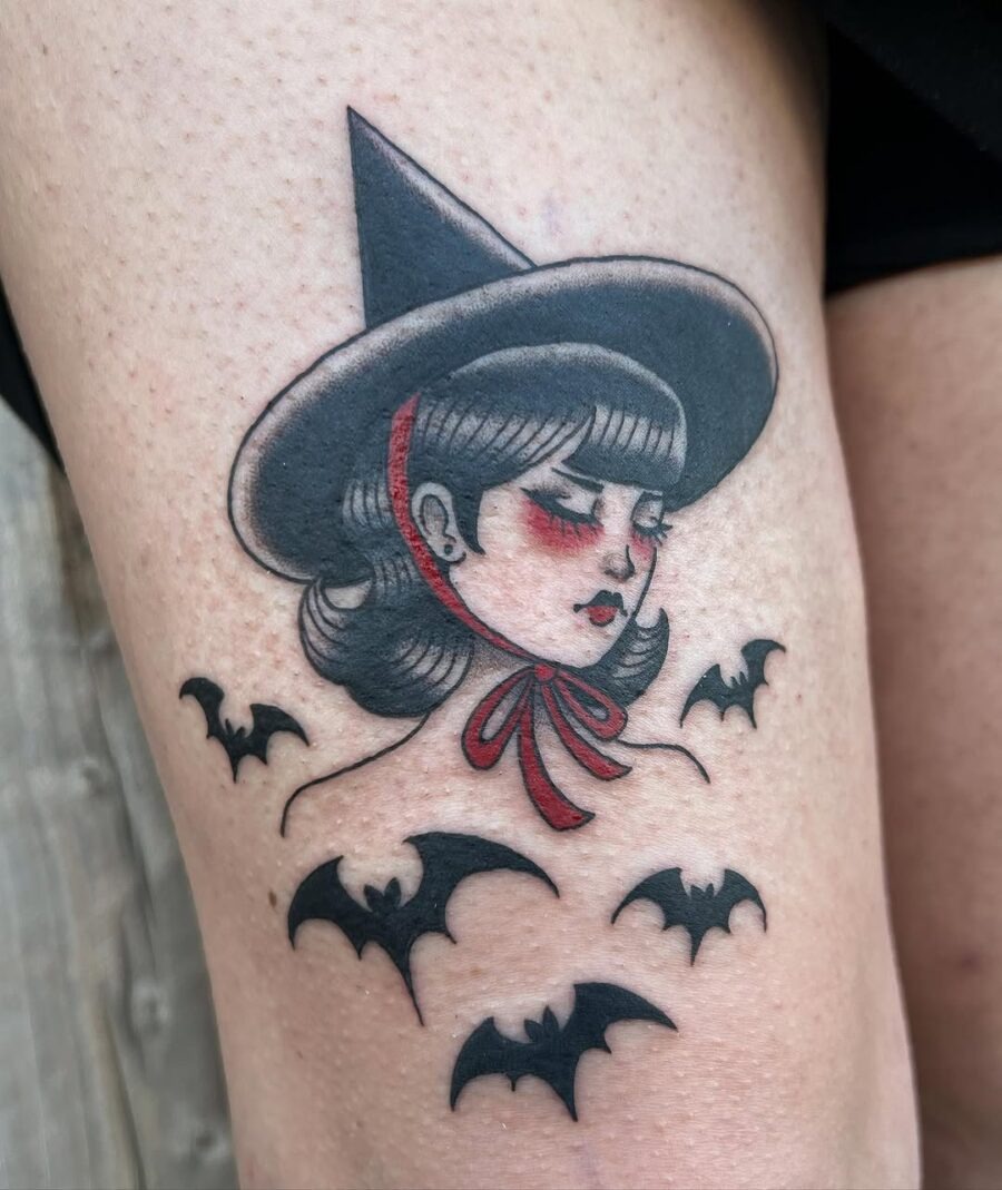 Enchanting witch hat tattoo with bat accents Tattoo Design