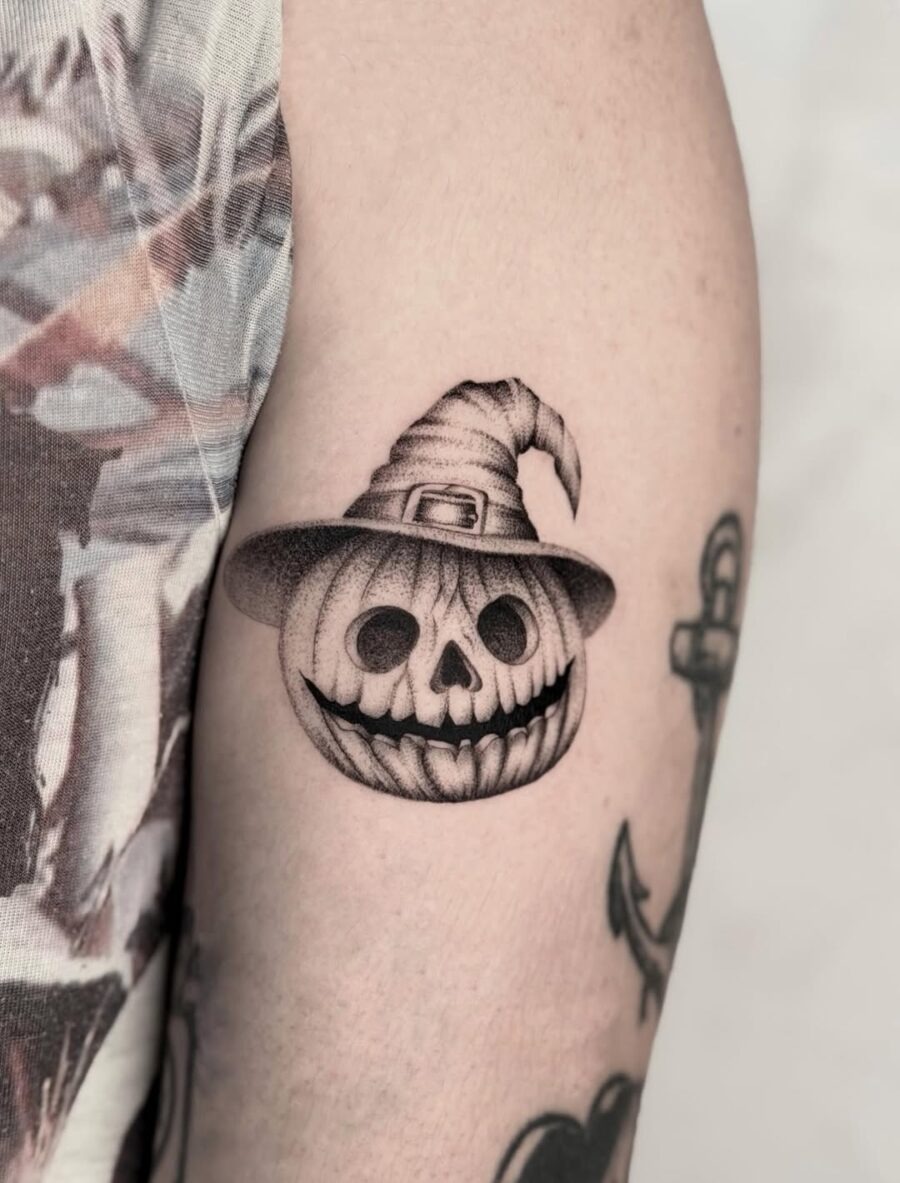 Spooky skull with witch hat design tattoo Tattoo Design