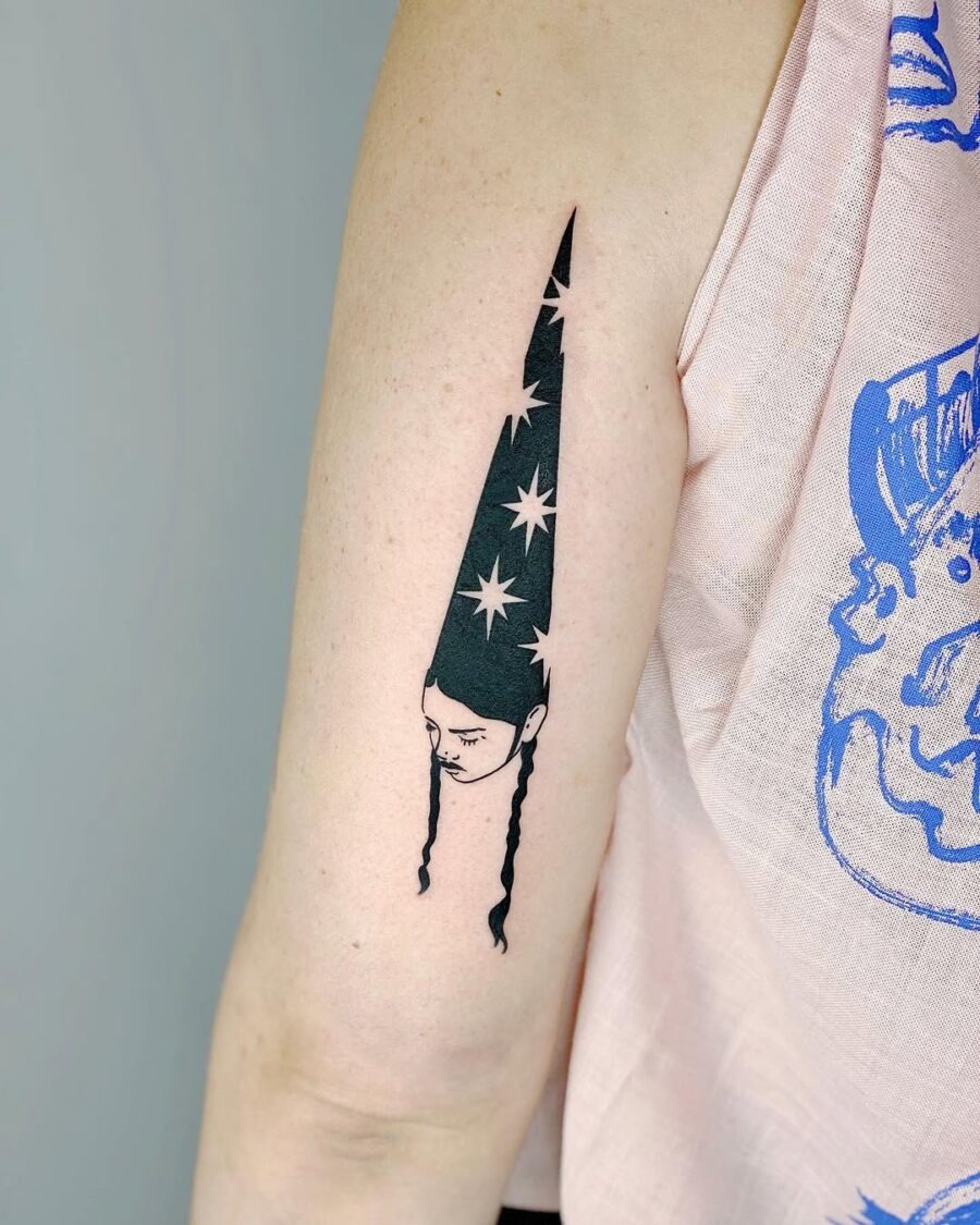 Unique witch hat tattoo with star accents Tattoo Design