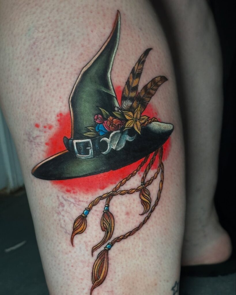 Enchanted Witch Hat with Feathers and Florals Tattoo Design
