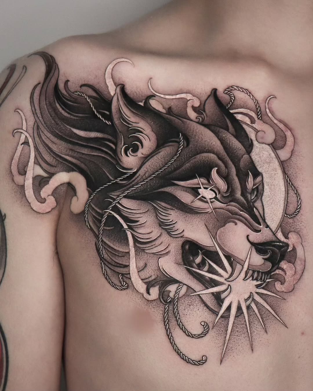 Bold wolf tattoo showcasing fierce artistry and detail Tattoo Design
