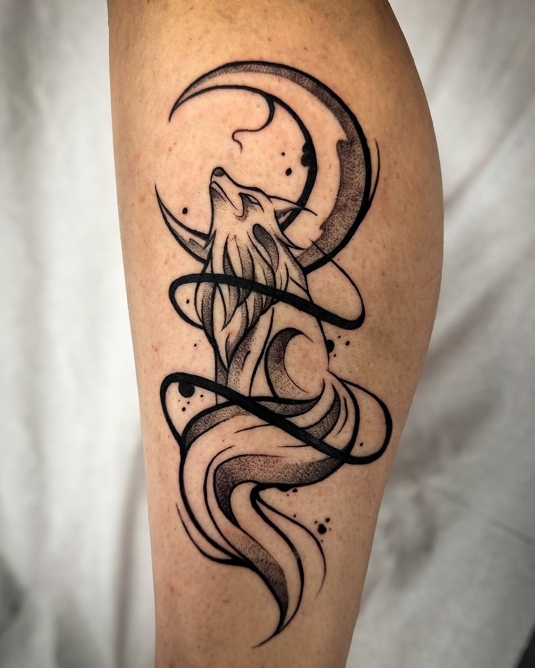 Elegant wolf tattoo with crescent moon design Tattoo Design