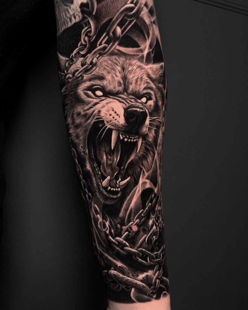 Intense wolf tattoo showcasing fierce energy. Tattoo Design