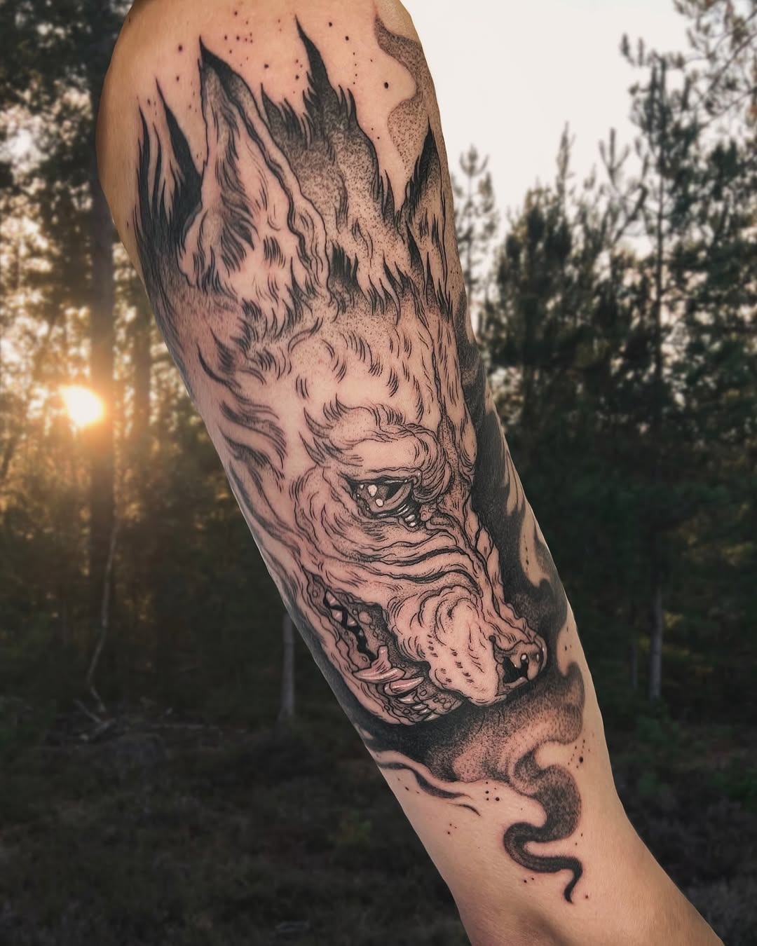 Intricate wolf tattoo in a natural setting Tattoo Design