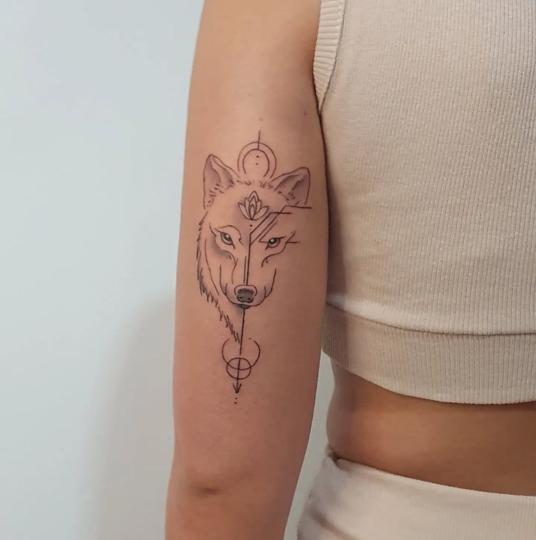 Intricate wolf tattoo with spiritual elements Tattoo Design