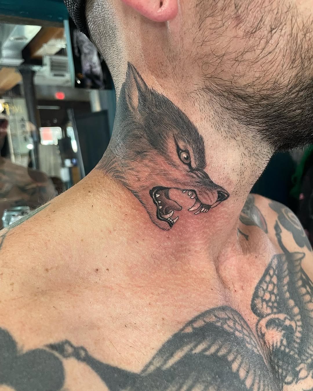 Realistic wolf tattoo design on the neck Tattoo Design