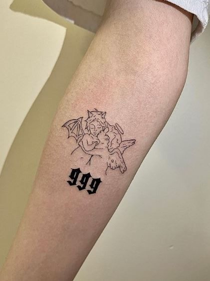 999 forearm tattoo with angel-devil art Tattoo Design