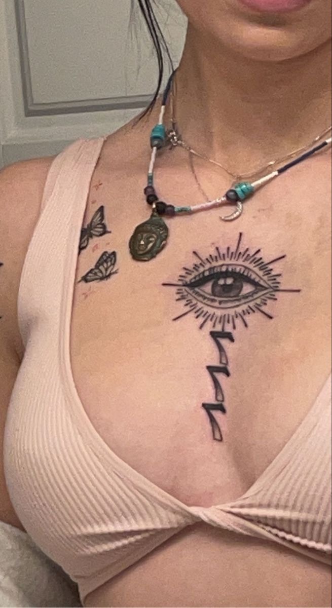 Chest eye with vertical 444 line Tattoo Design