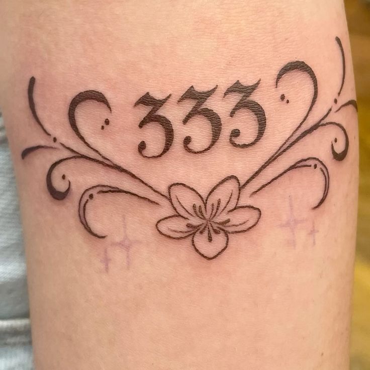 Floral scroll 333 tattoo Tattoo Design