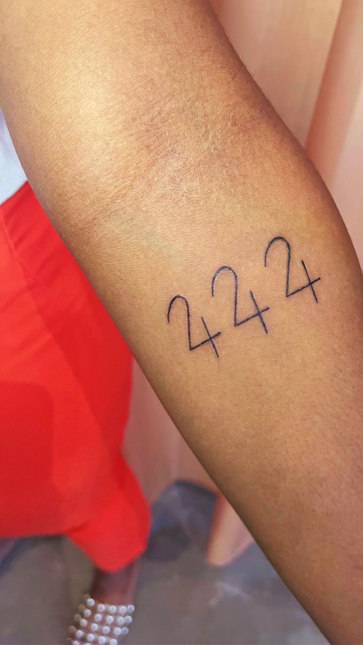 Minimal 2424 forearm number Tattoo Design