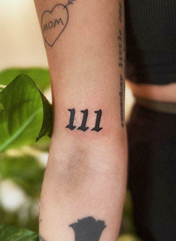 Strong 111 angel number on the arm Tattoo Design