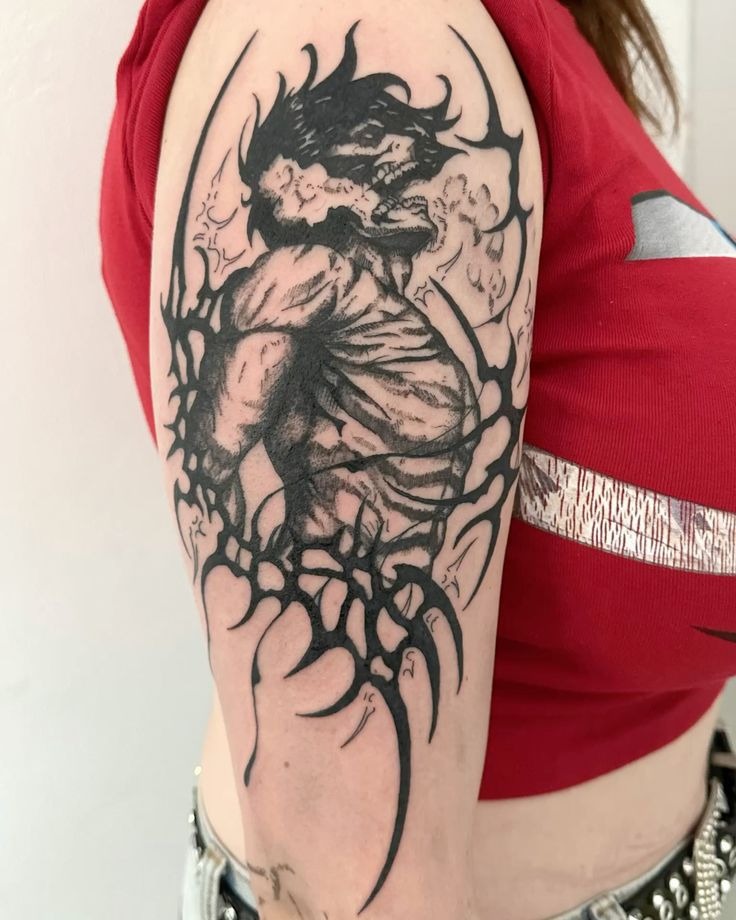 Abstract Titan Silhouette Upper Arm Tattoo Tattoo Design