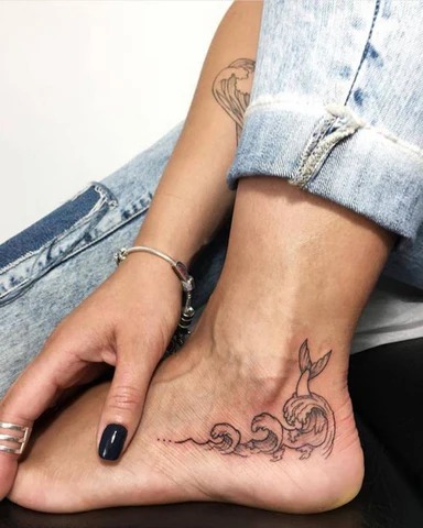 A Mermaid's Tale on the Foot Tattoo Design