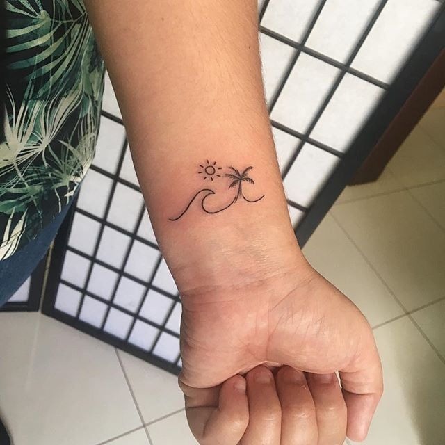 Minimalist Wave and Palm Tree Tattoo Design