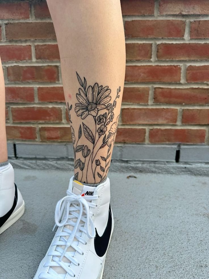 Fine Line Daisy and Botanicals Tattoo Design