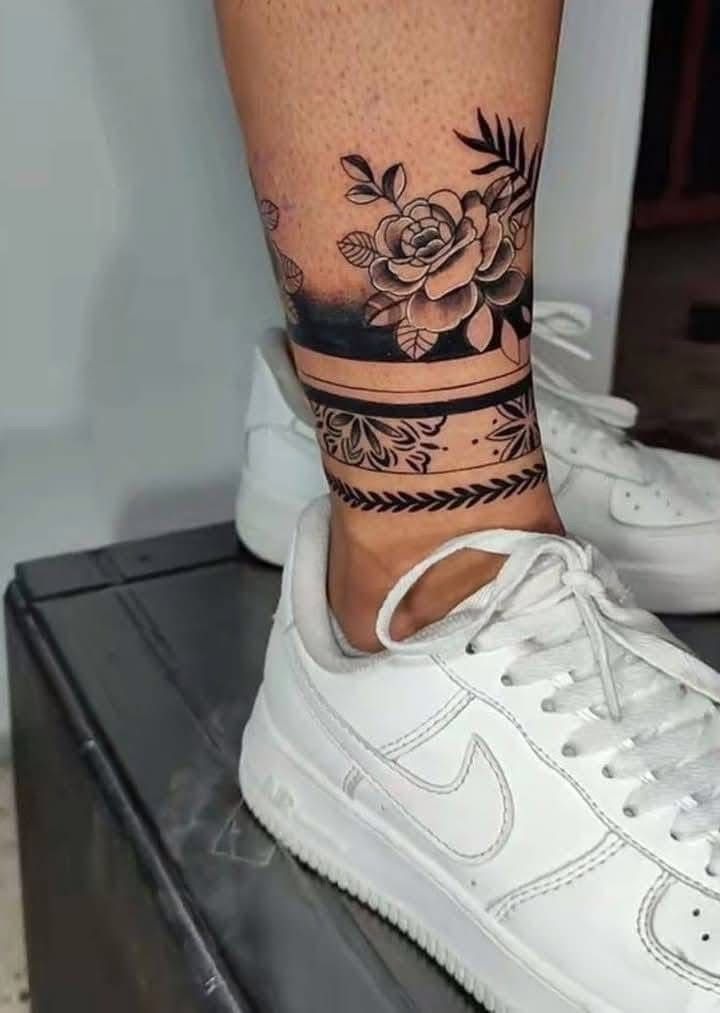 Floral Band with Tribal Elements Tattoo Design