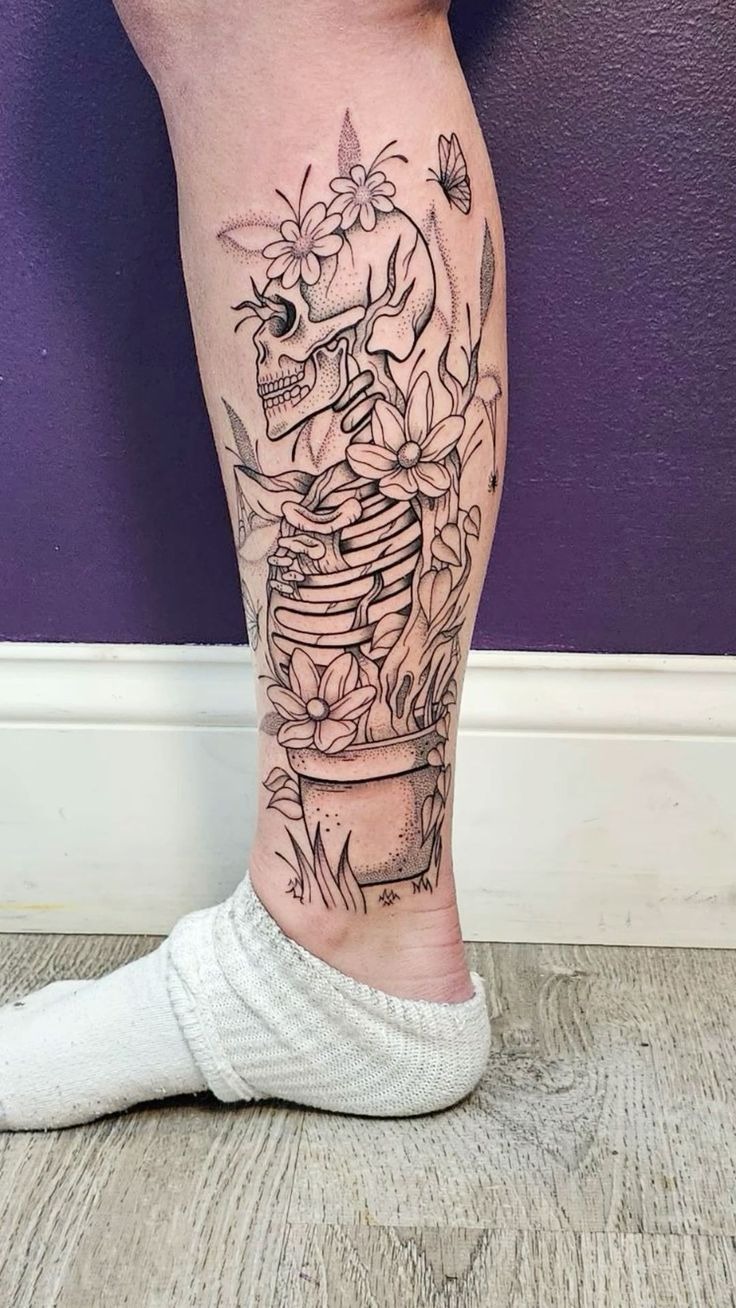Skeleton in Bloom Tattoo Design