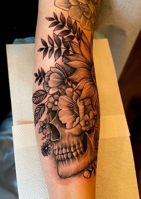 Skull with Floral Fusion Tattoo Design