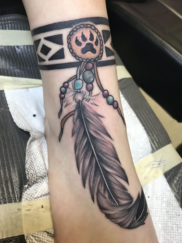 Feather Armband Tattoo with Paw Print Symbol Tattoo Design