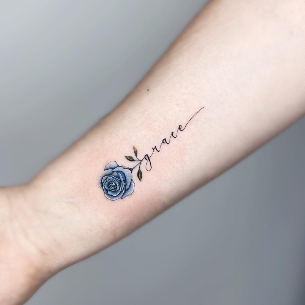 Cross with Blossoming Flowers Tattoo Tattoo Design