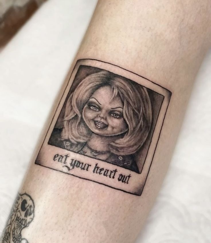 Chucky Heart-Shaped Portrait Tattoo Design