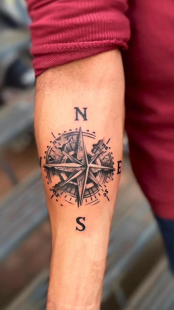Torn Map Compass Tattoo Design