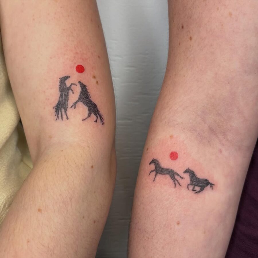 Charming Horse Tattoos with Playful Red Dots Tattoo Design