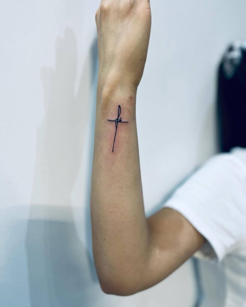 Minimalist Crucifix Tattoo Design