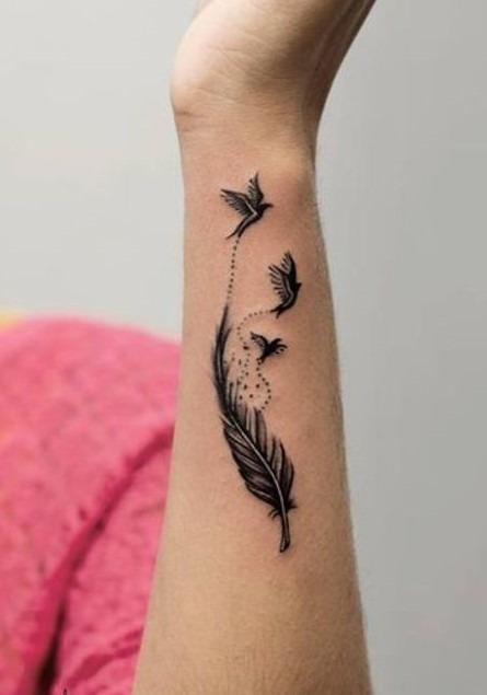 Feathers are often associated with freedom and the idea of rising above challenges.