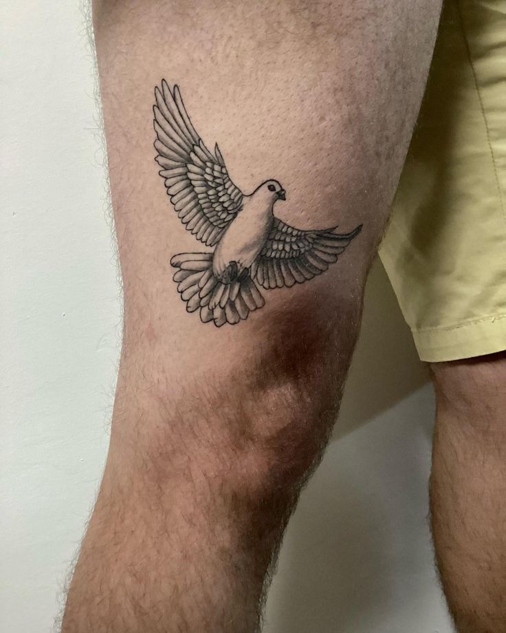 Classic Flying Dove on the Thigh Tattoo Design