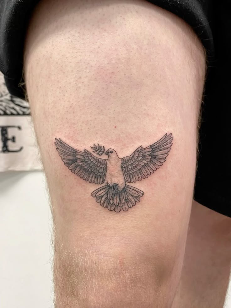 Minimalist Thigh Dove Tattoo Design