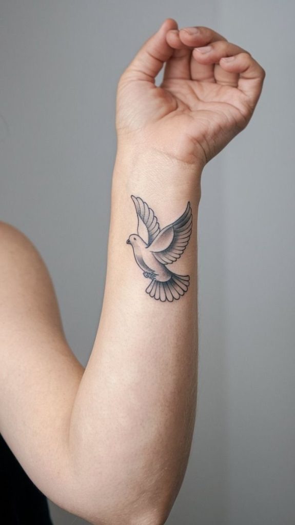 Minimalist wrist flight Tattoo Design