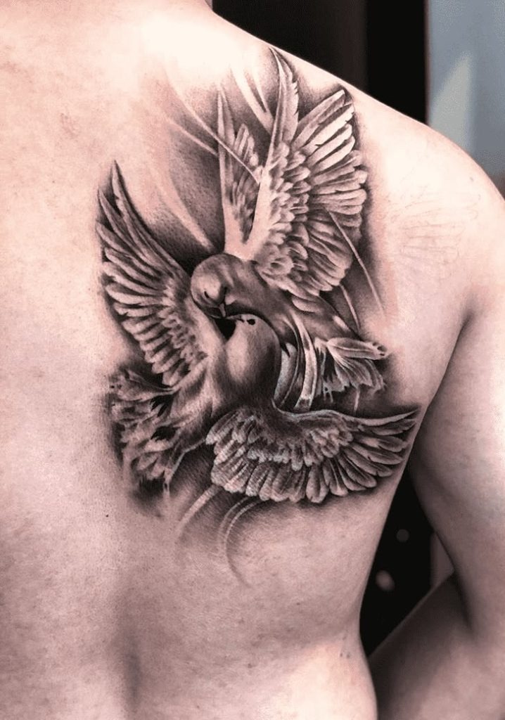 Two doves in flight: Unity and Motion Tattoo Design