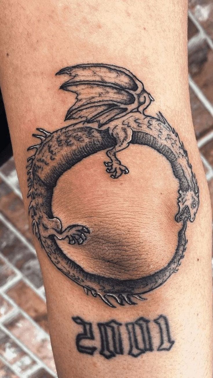 Gothic Skull Cap Framing the Elbow Tattoo Design