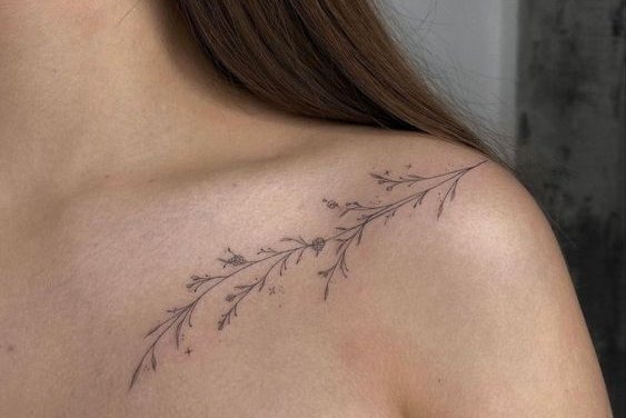 Geometric Flower with Color Accents Tattoo Design