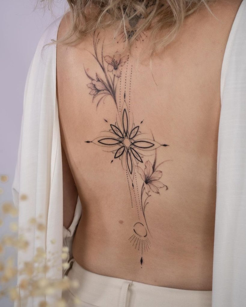 Spiritual Sun and Flower Spine Tattoo Tattoo Design