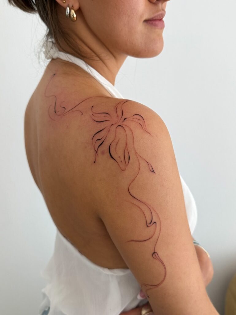 Abstract Fine Line Flower with Flowing Stems Tattoo Design