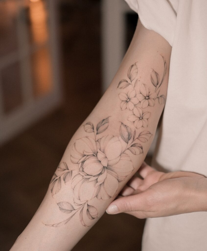 Elegant Fine Line Floral Arm Tattoo Tattoo Design