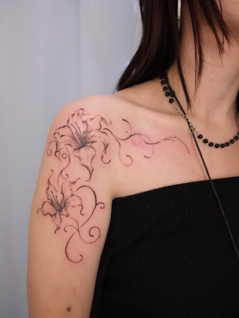 Graceful Lily Shoulder Tattoo Tattoo Design