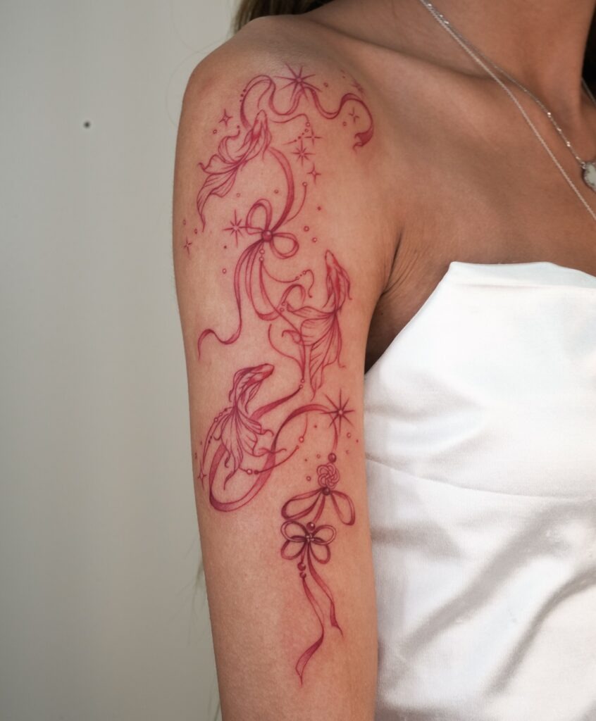 Red Ink Tattoo with Ribbons and Fish Tattoo Design
